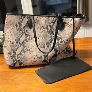 Steve Madden faux snakeskin tote bag with matching zip pouch.